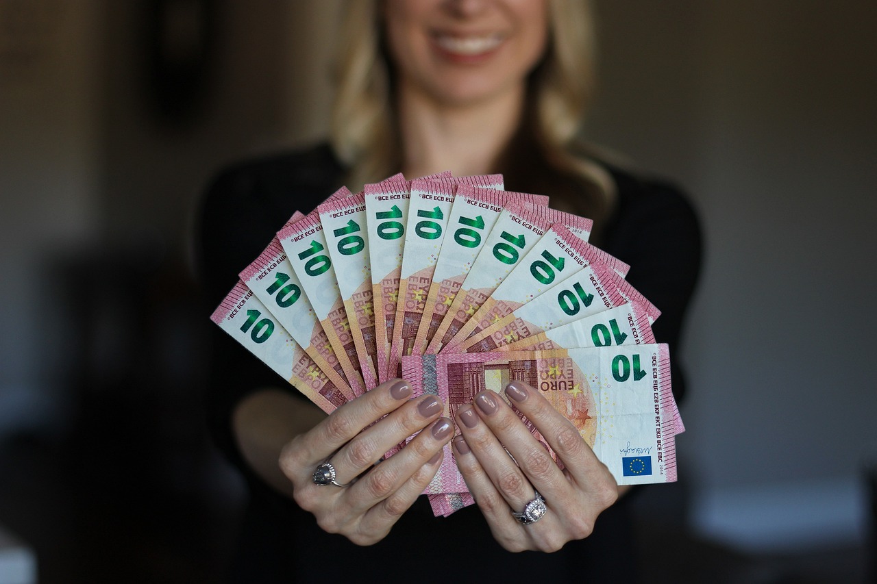 who-we-are woman, happy, money, euro, bills, hand, stack, earn, income, interests, economy, finance, business, profit, loan, credit, give, borrow, lend, investment, income, loan, loan, loan, loan, loan